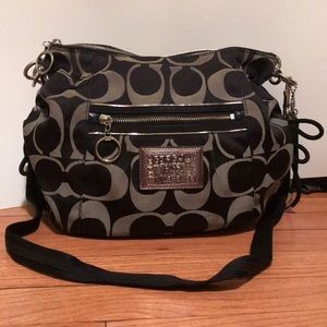 Black and silver Coach crossbody